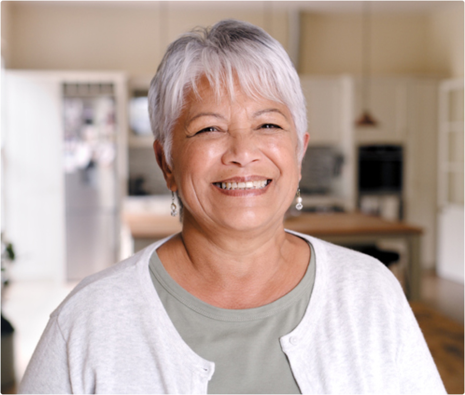 Stock photo of an older woman smiling.
